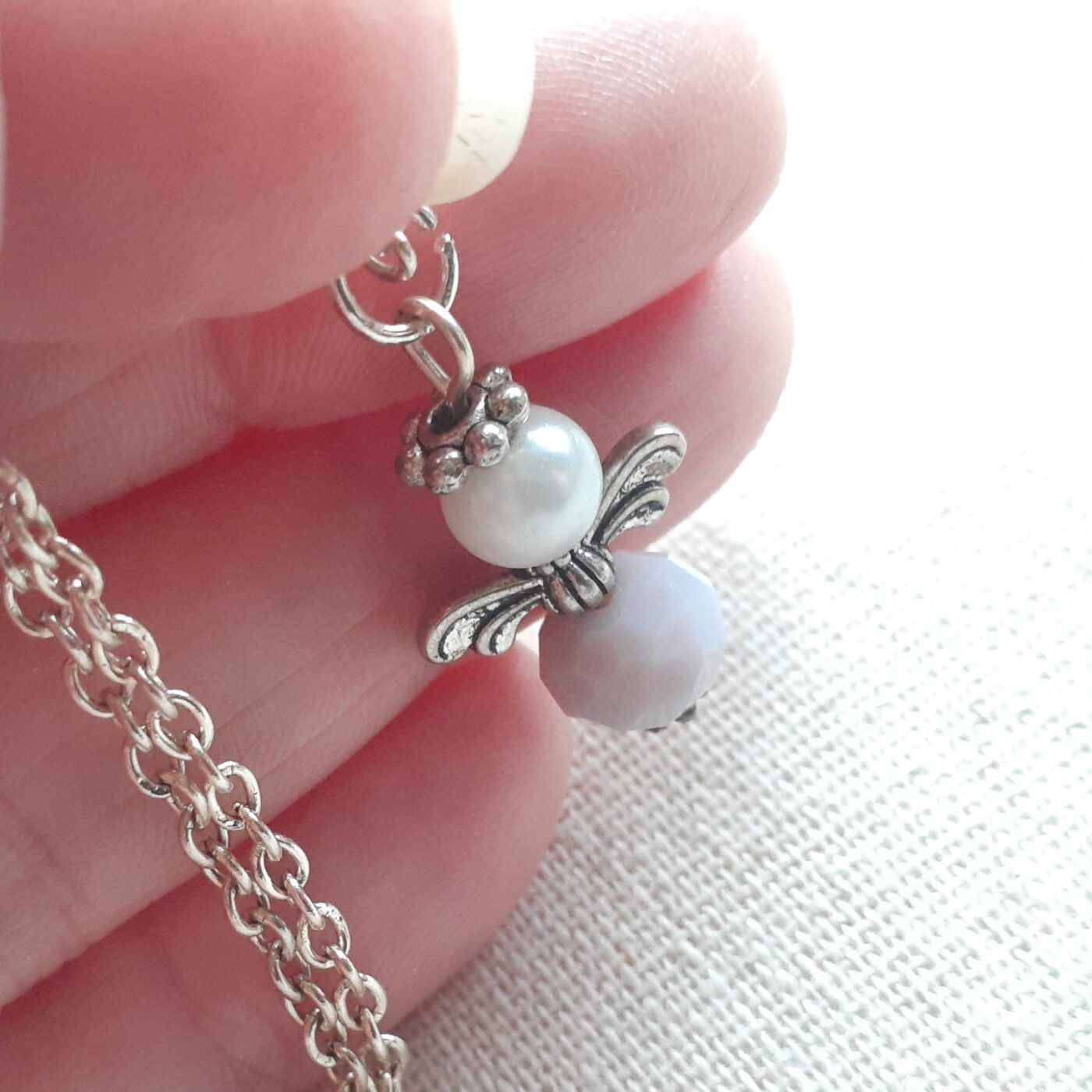 Sterling Silver Chain Necklace with Lava Bead and Swarovski crystal Angel Charm and 3D Brass Feather Charm