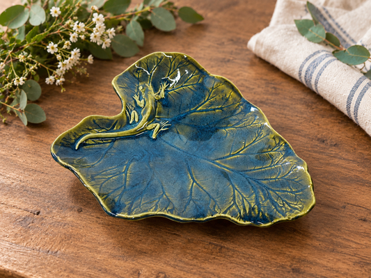 Leaf-shaped ceramic platter, blue with green rim and raised vine-vein texture