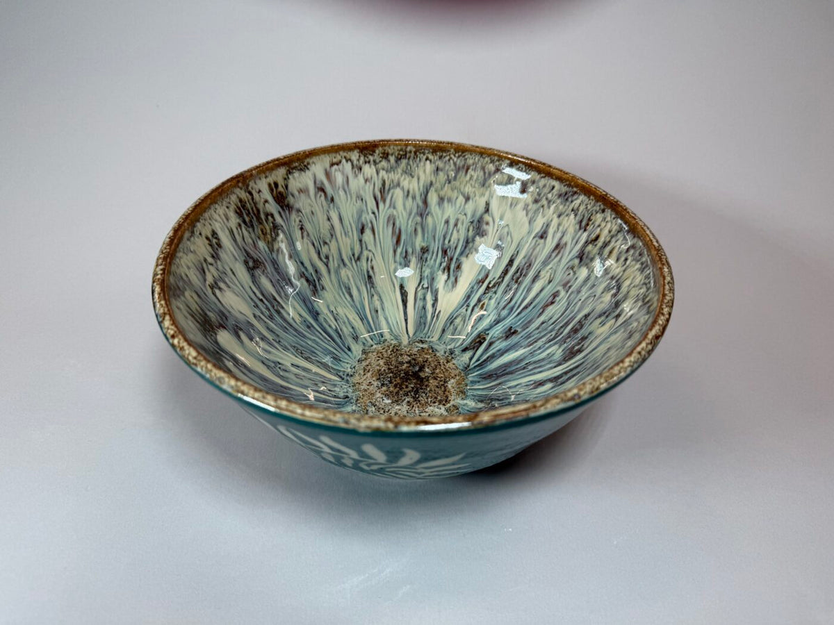 Ceramic bowl teal interior with radial fern pattern, speckled base, brown rim