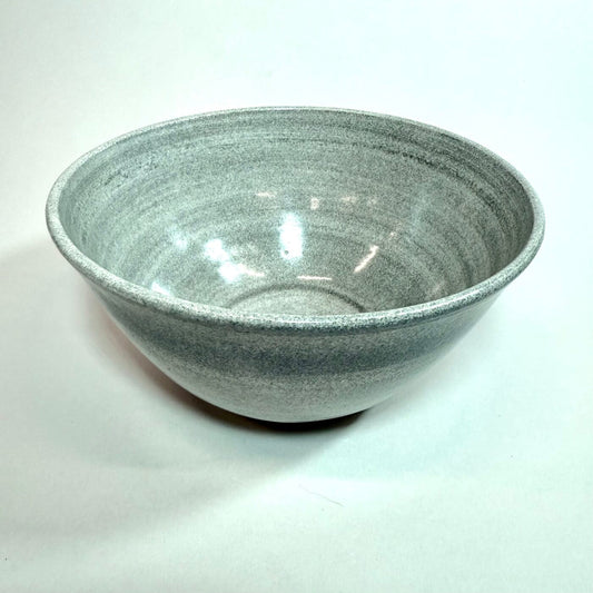 Granite bowl, dark gray ceramic with speckled texture and wide rim