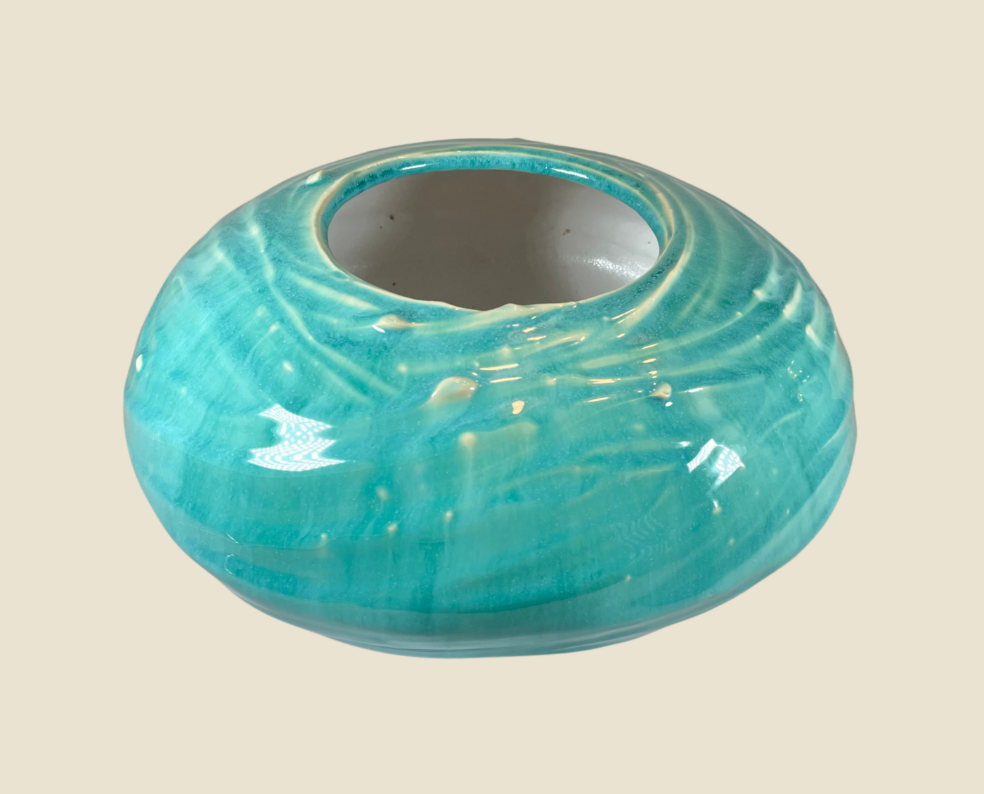 Artisan crackle vase in teal with circular mouth opening and crackled glaze pattern