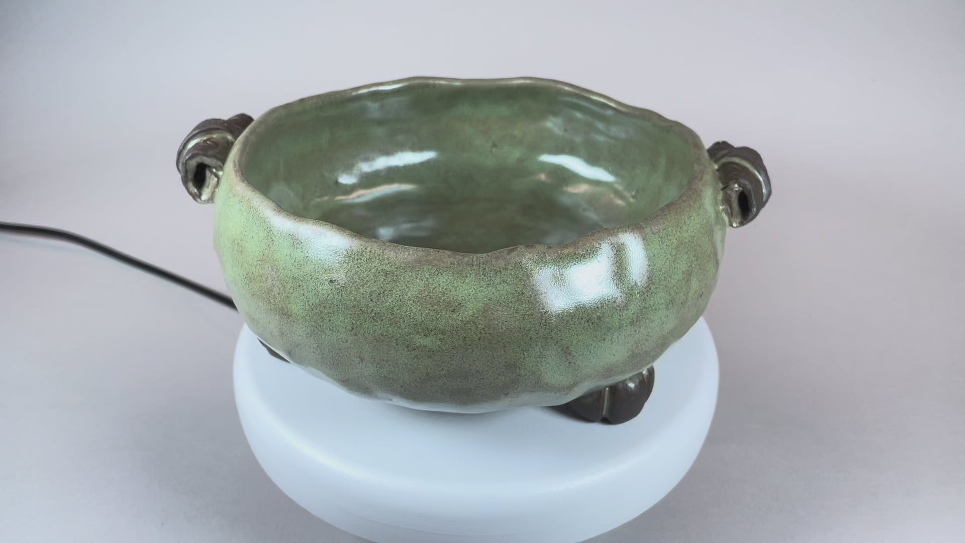 pinch bowl, blk clay green tea.MOV