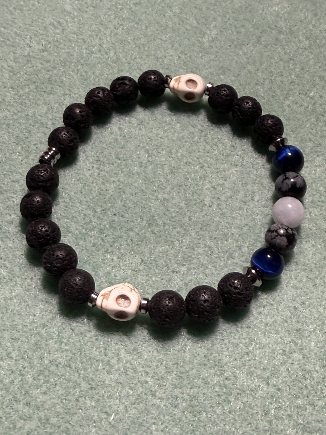 Lava Stone, Howl Lite Skull Bracelet
