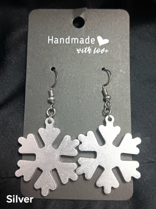 Silver snowflake dangle earrings with fishhook and bead accents