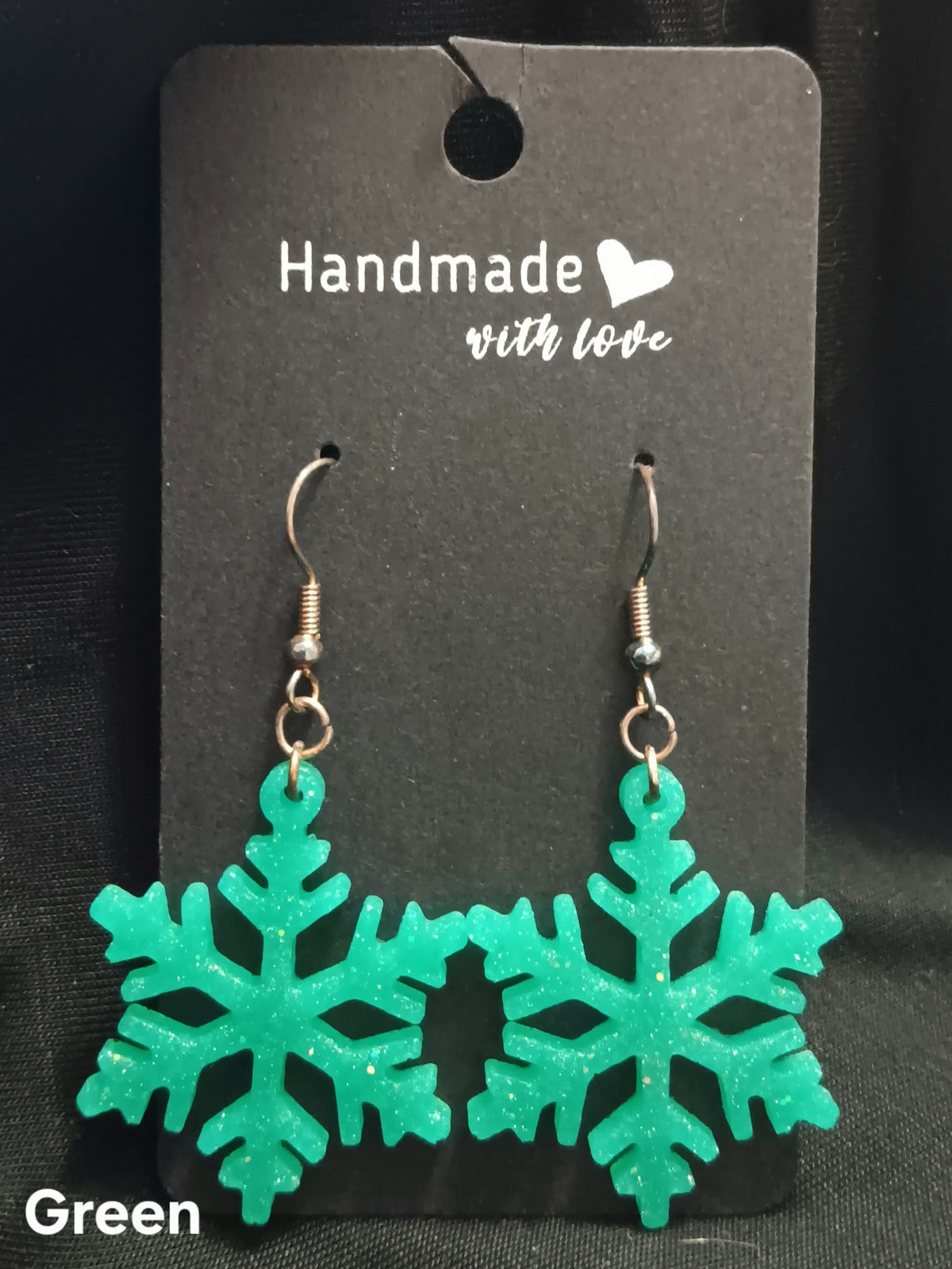 Green thin snowflake dangle earrings, fishhook with dangling snowflake drops