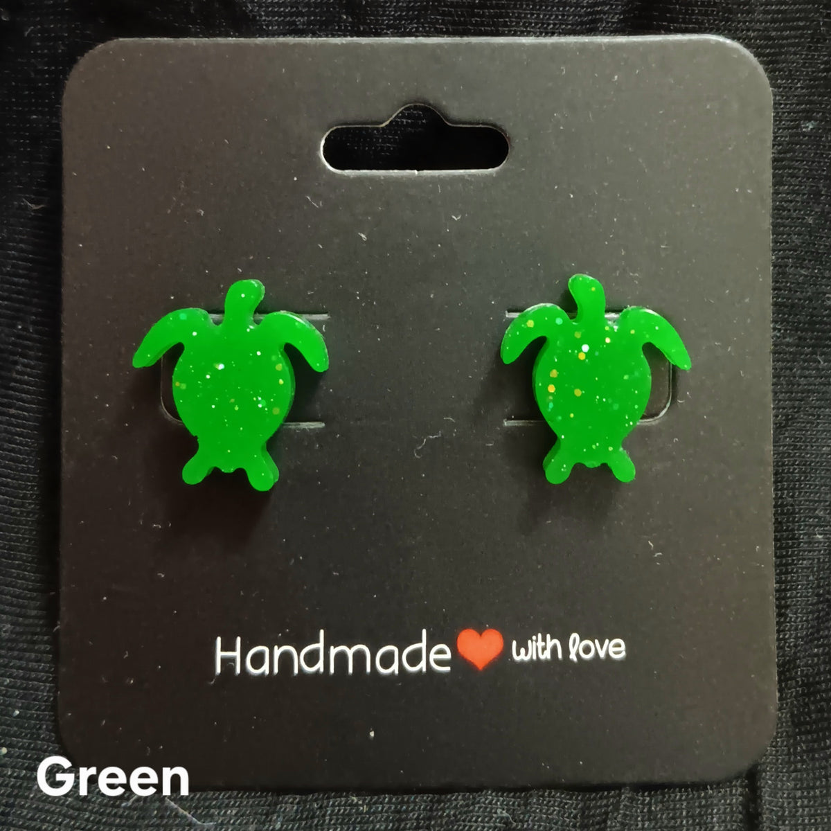 Green turtle stud earrings with glossy resin turtle shapes, stud backs