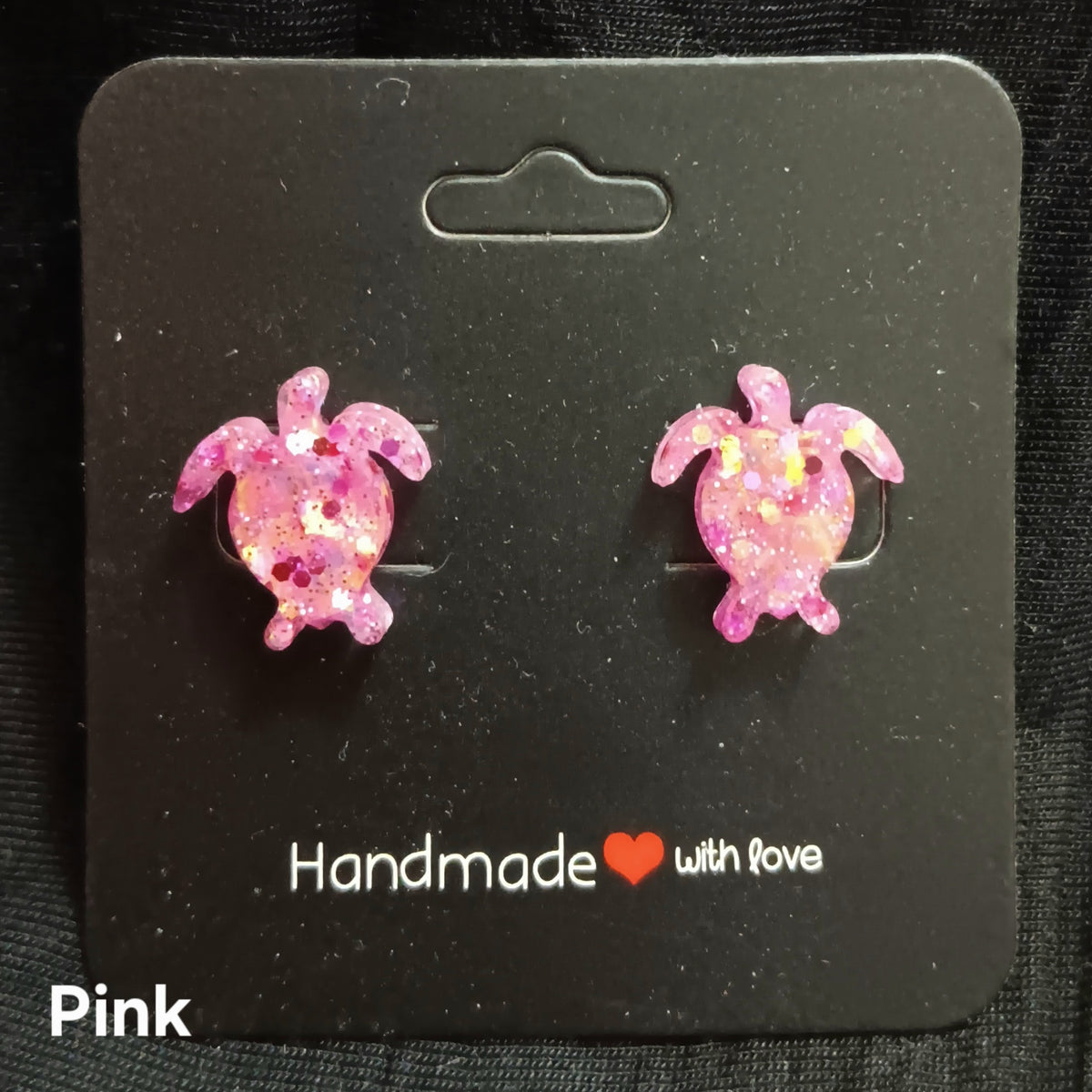 Pink turtle stud earrings with glittery resin turtle shapes, stud backs