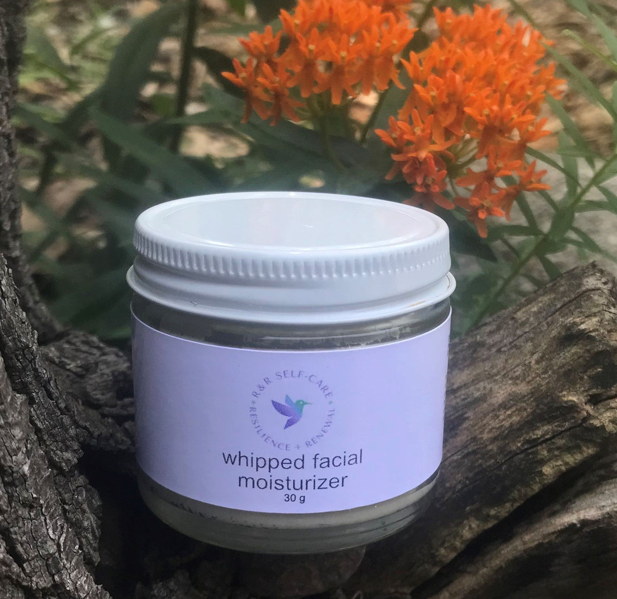 Whipped facial moisturizer jar with white lid, purple container, 30 g